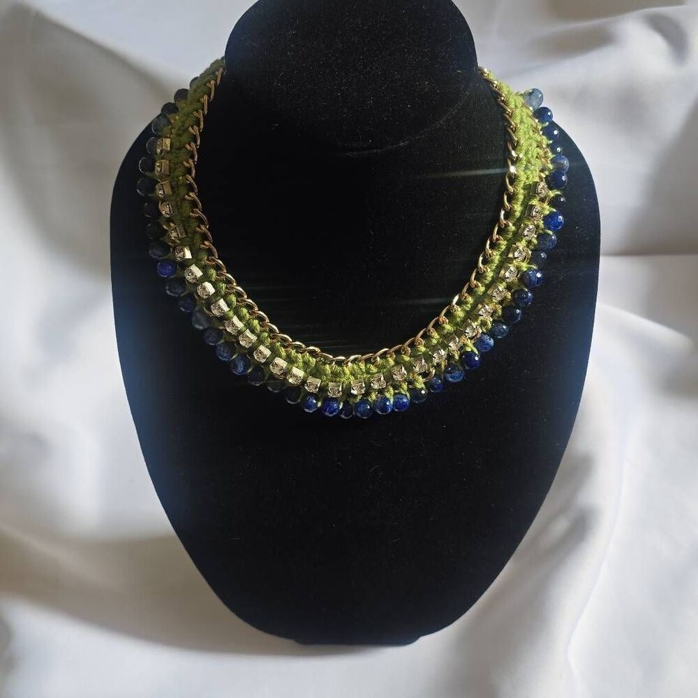 This statement necklace features a multi-strand, mixed-media design, NWOT, 16.5"